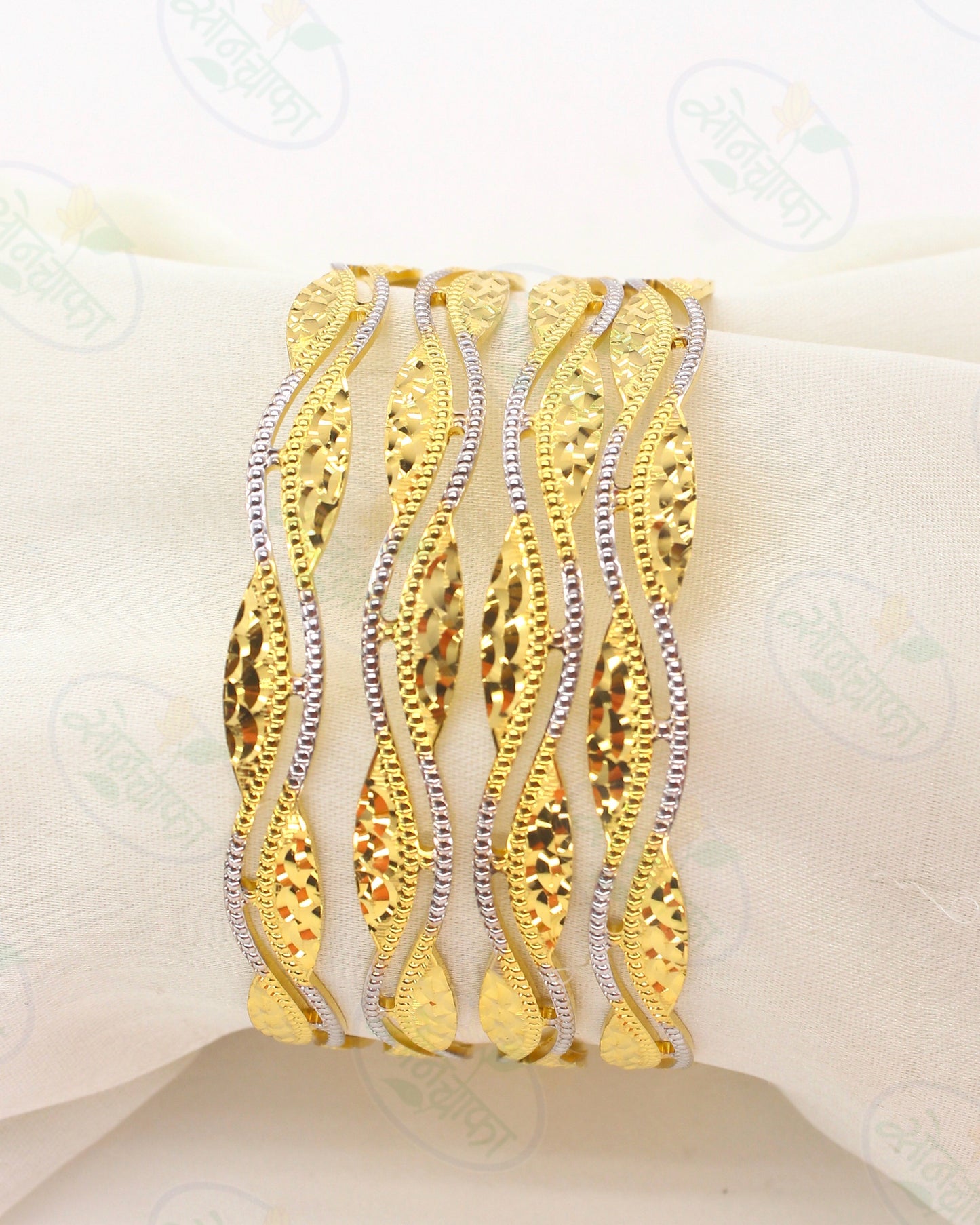 ENTICING GOLD TONE BANGLES