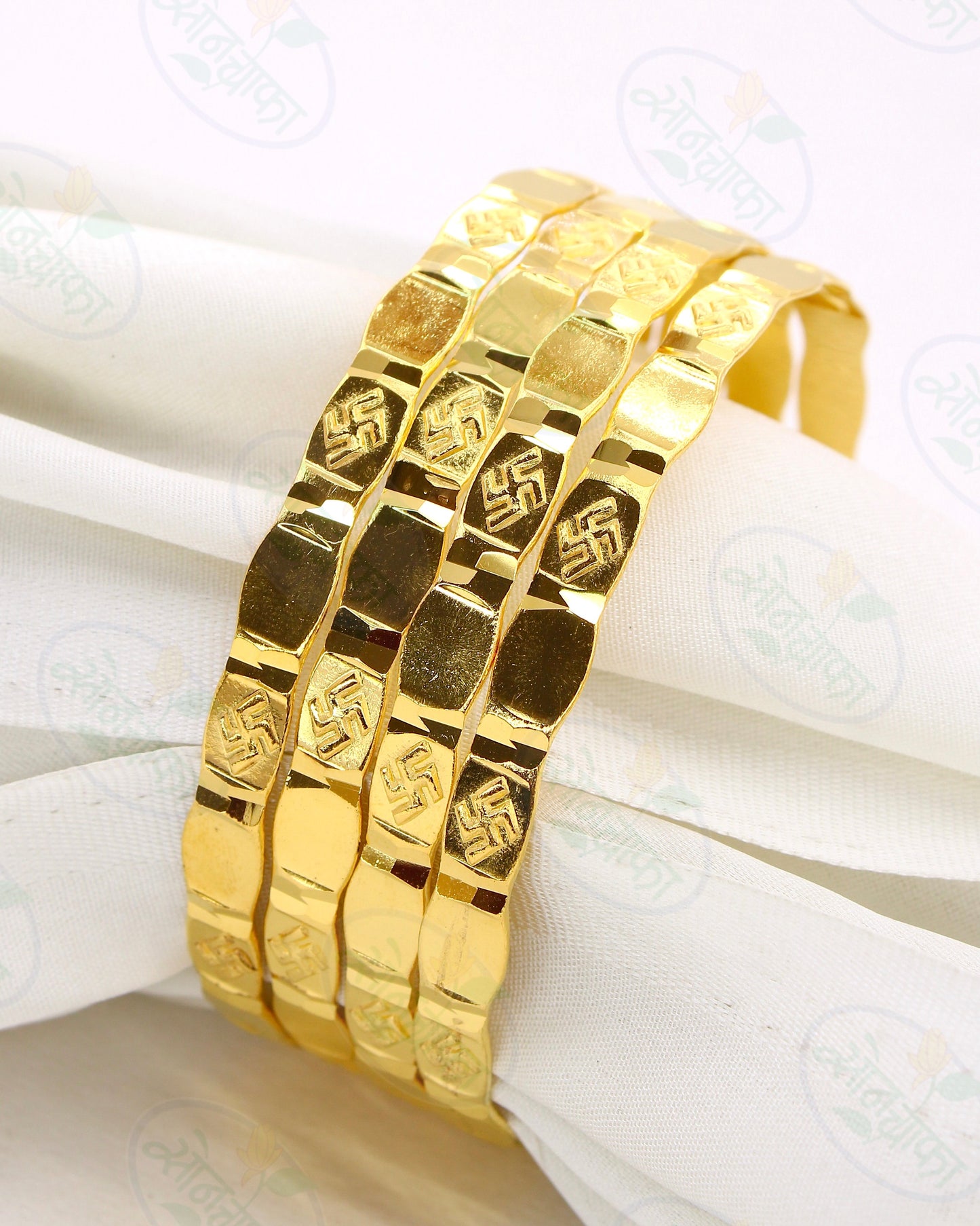 RAVISHING SWASTIK GOLD PLATED BANGLES