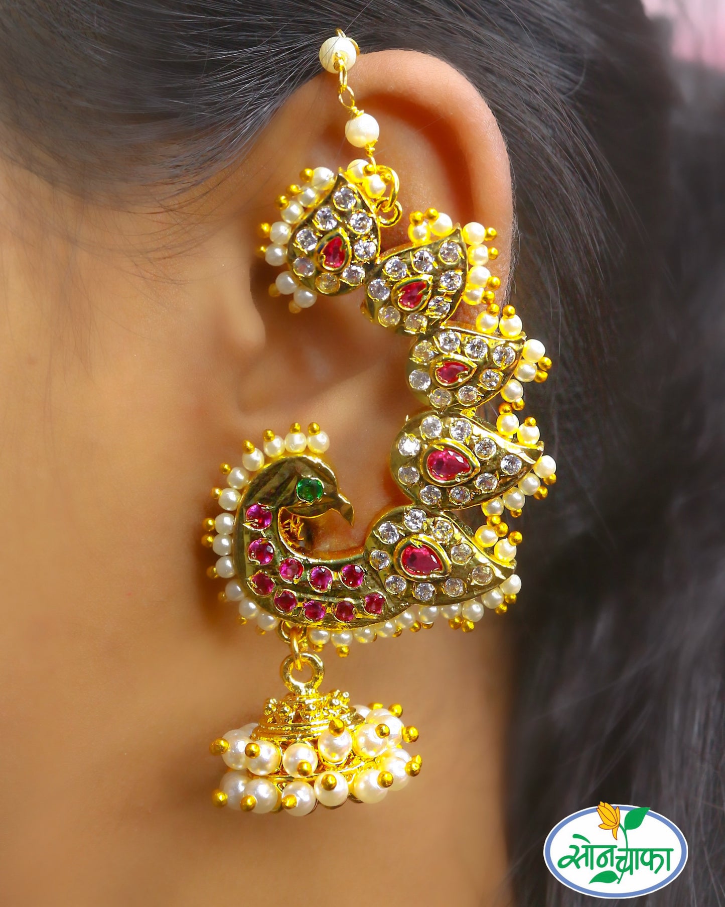 STRIKING PEACOCK EAR-CUFFS