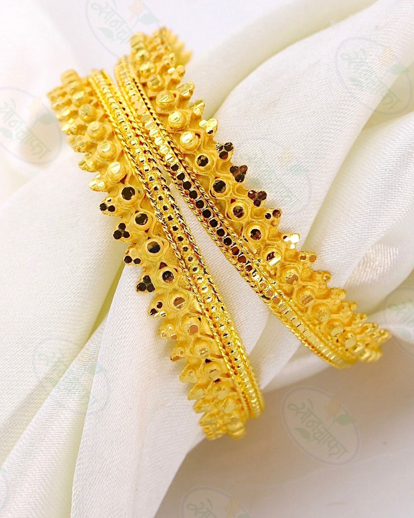 Gold pichodi on sale bangles designs