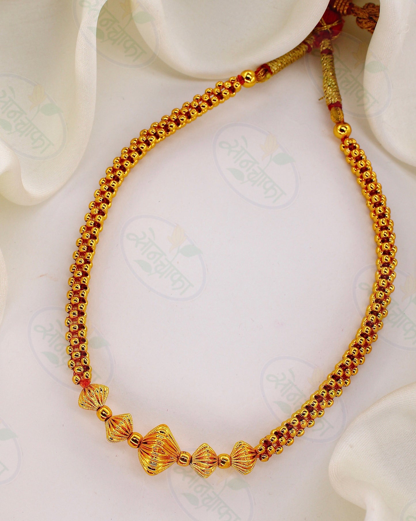 DESIGNER GOLDEN BEADS THUSHI