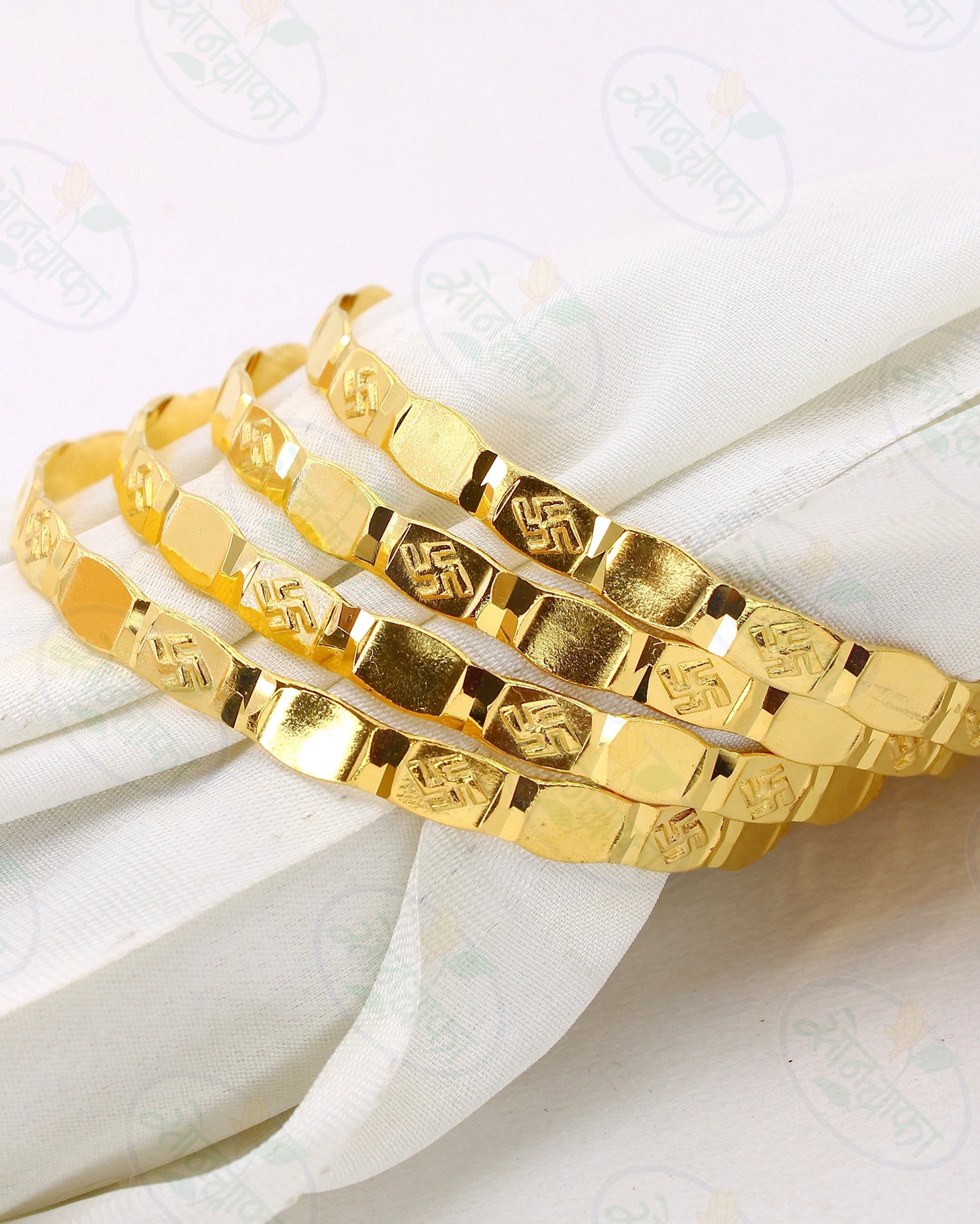 RAVISHING  SWASTIK GOLD PLATED BANGLES