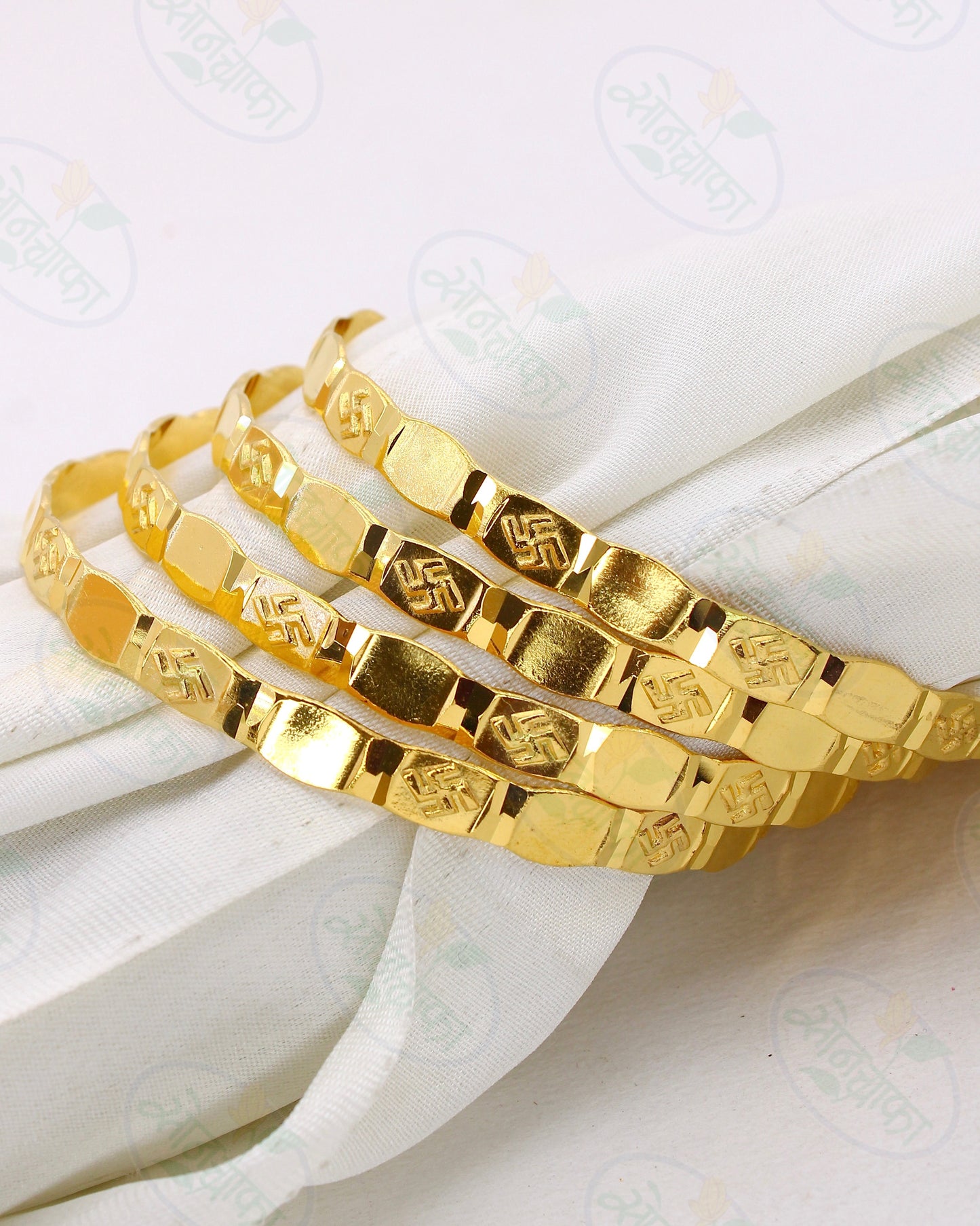 RAVISHING  SWASTIK GOLD PLATED BANGLES
